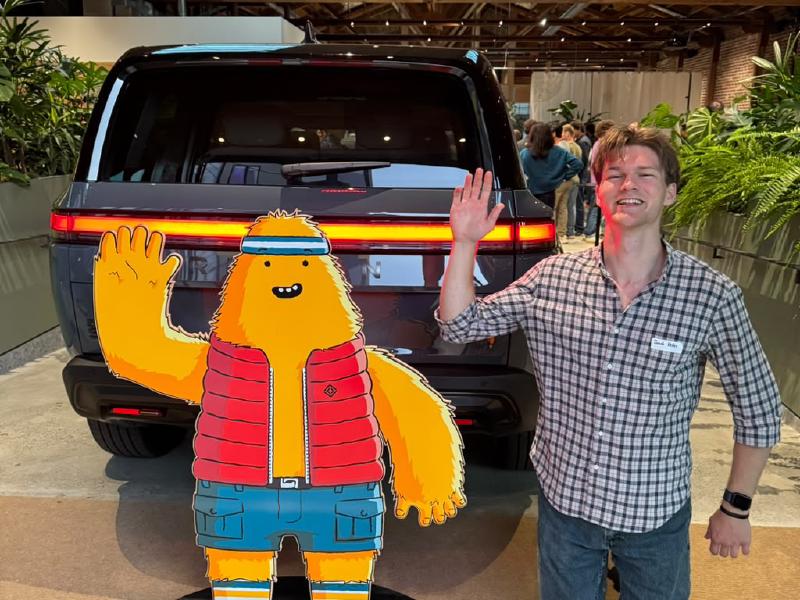 Posing with Gear Guard Gary at the San Francisco Rivian showroom